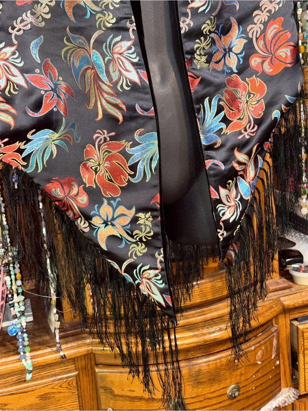 black floral embroidered silk like boho shawl featuring long fringe trim